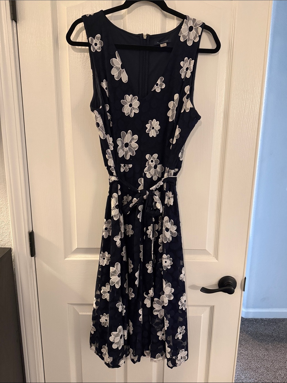Tommy Hilfiger Daisy Mesh Belted Dress featuring a floral print on navy fabric.